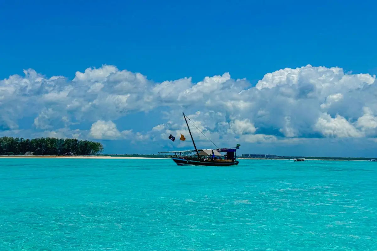 Traditional dhow sailing on turquoise waters off Zanzibar