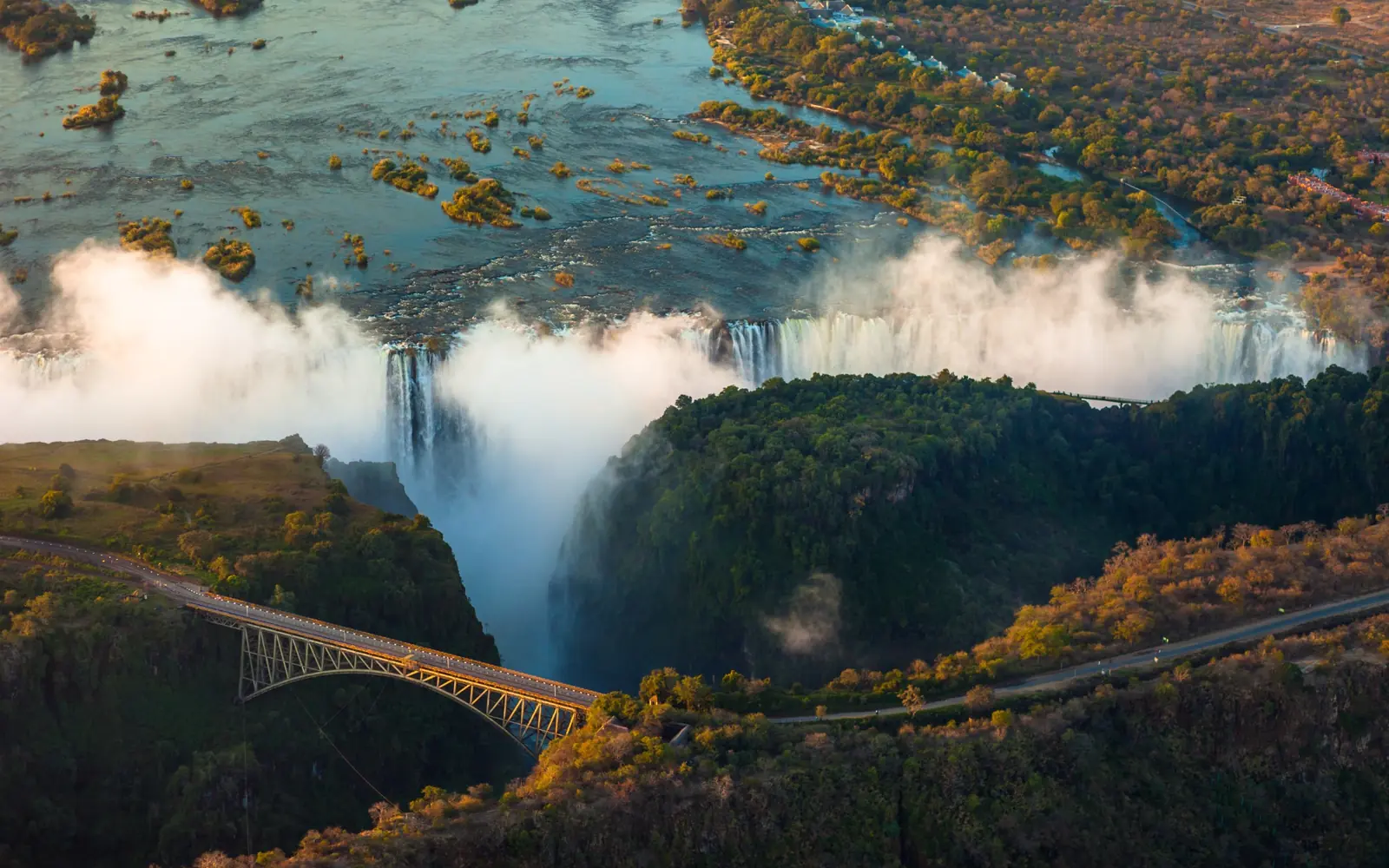 Aerial view of Victoria Falls and its bridge in Zimbabwe